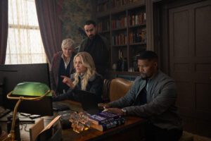 Back In Action. (L to R) Glenn Close as Ginny, Jamie Demetriou as Nigel, Cameron Diaz as Emily and Jamie Foxx as Matt in Back In Action. Cr. John Wilson/Netflix © 2024.